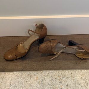2.5 inch caramel brown heels. Some wear on straps but outer leather looks good.